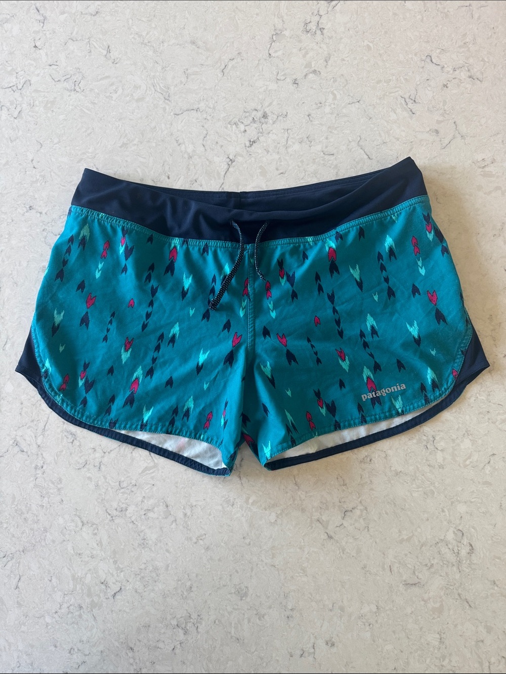 Patagonia Nine Trails Wish Tails: Elwha Blue Women’s size L 4” inseam baggies